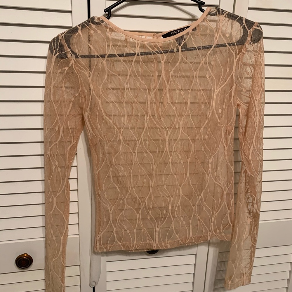 Cream colored see-through long sleeve top